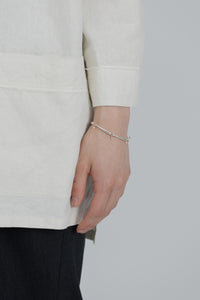 RENEE SWIRL LINE BRACELET – h'eres