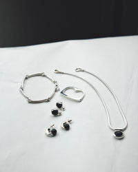 RENEE SWIRL LINE BRACELET – h'eres